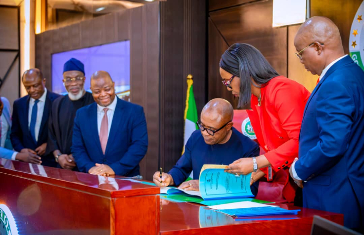 Enugu State Governor, Peter Mbah, signing the 2026 budget